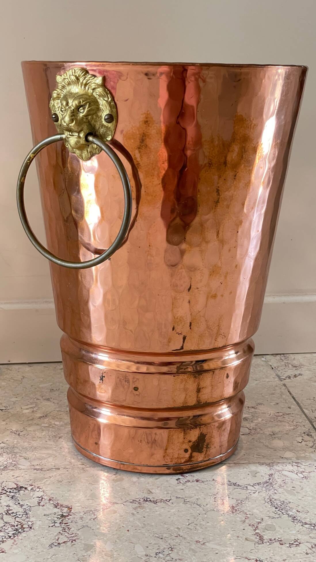 Vintage copper lion's head umbrella holder
