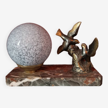 Bird and globe lamp