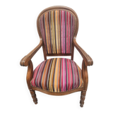 Antique armchair in multi-colored striped velvet with turned legs