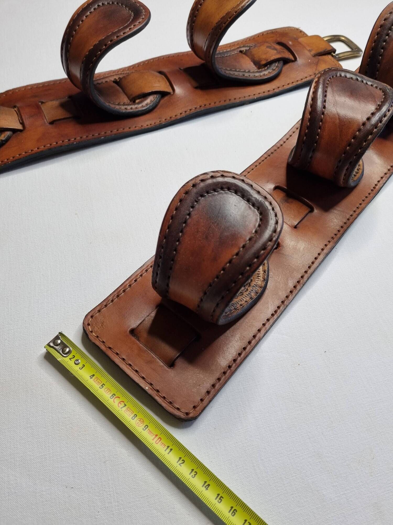 Pair of game bags in saddle leather and brass, old, 3 hooks, 57 cm