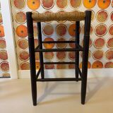 High stool made of wood and straw