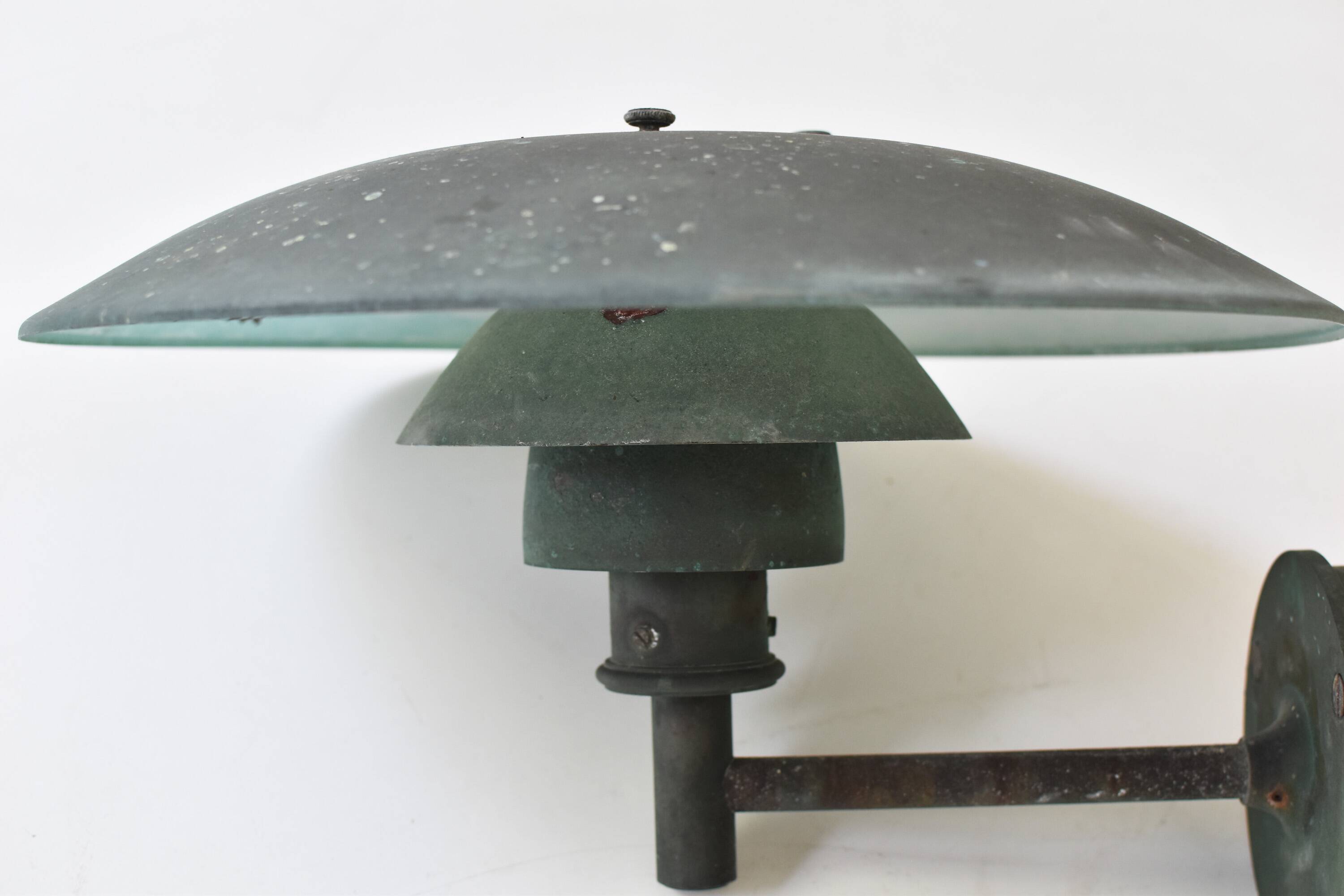 A set of two ph 4.5 copper wall lamps by poul henningsen for louis poulsen, denmark 1980s.