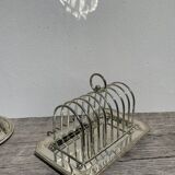 Flat silver metal tray with duck and toast