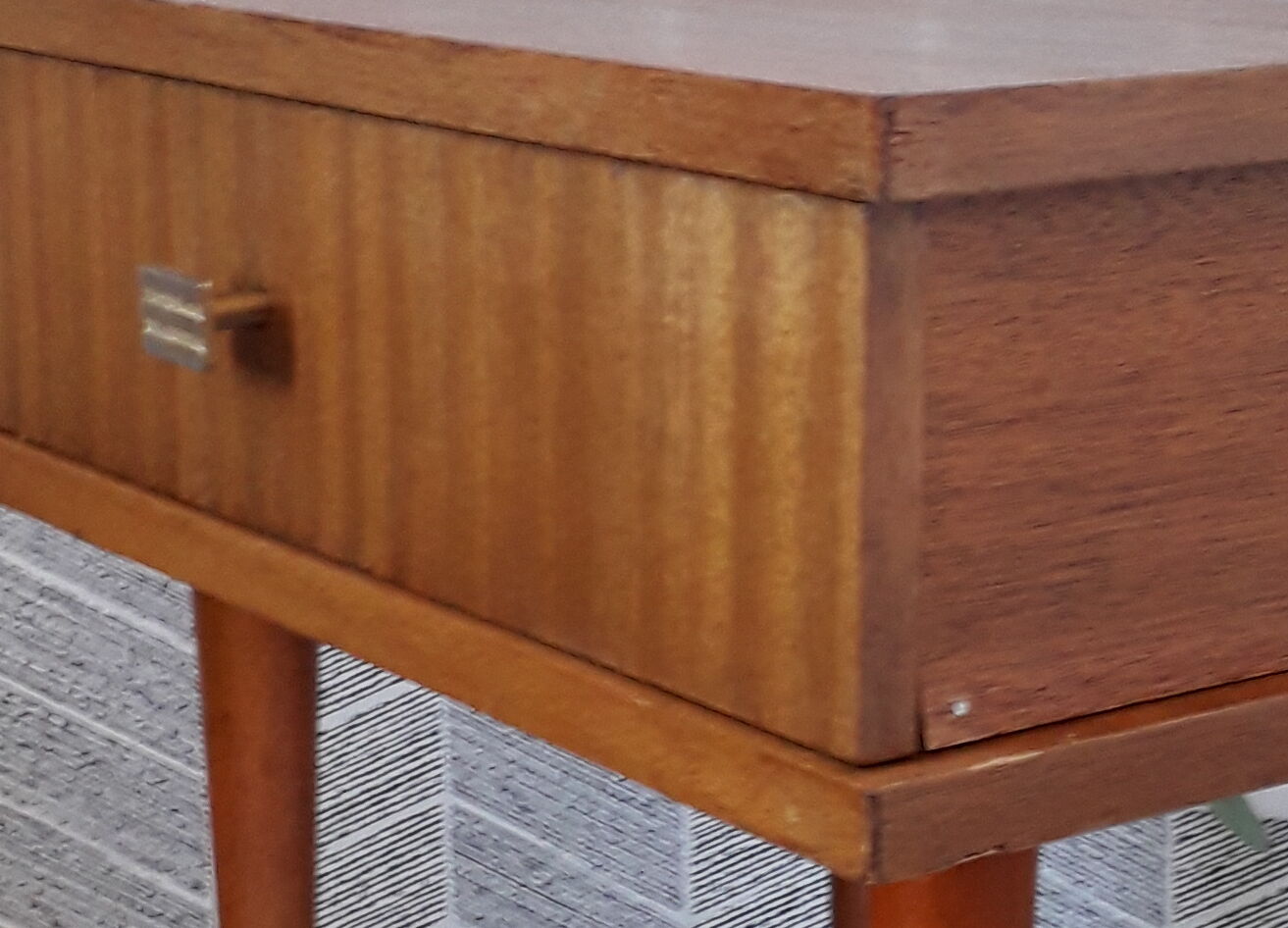 Bedside table with compass feet