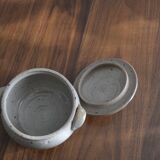 Ceramic pot with sandstone lid