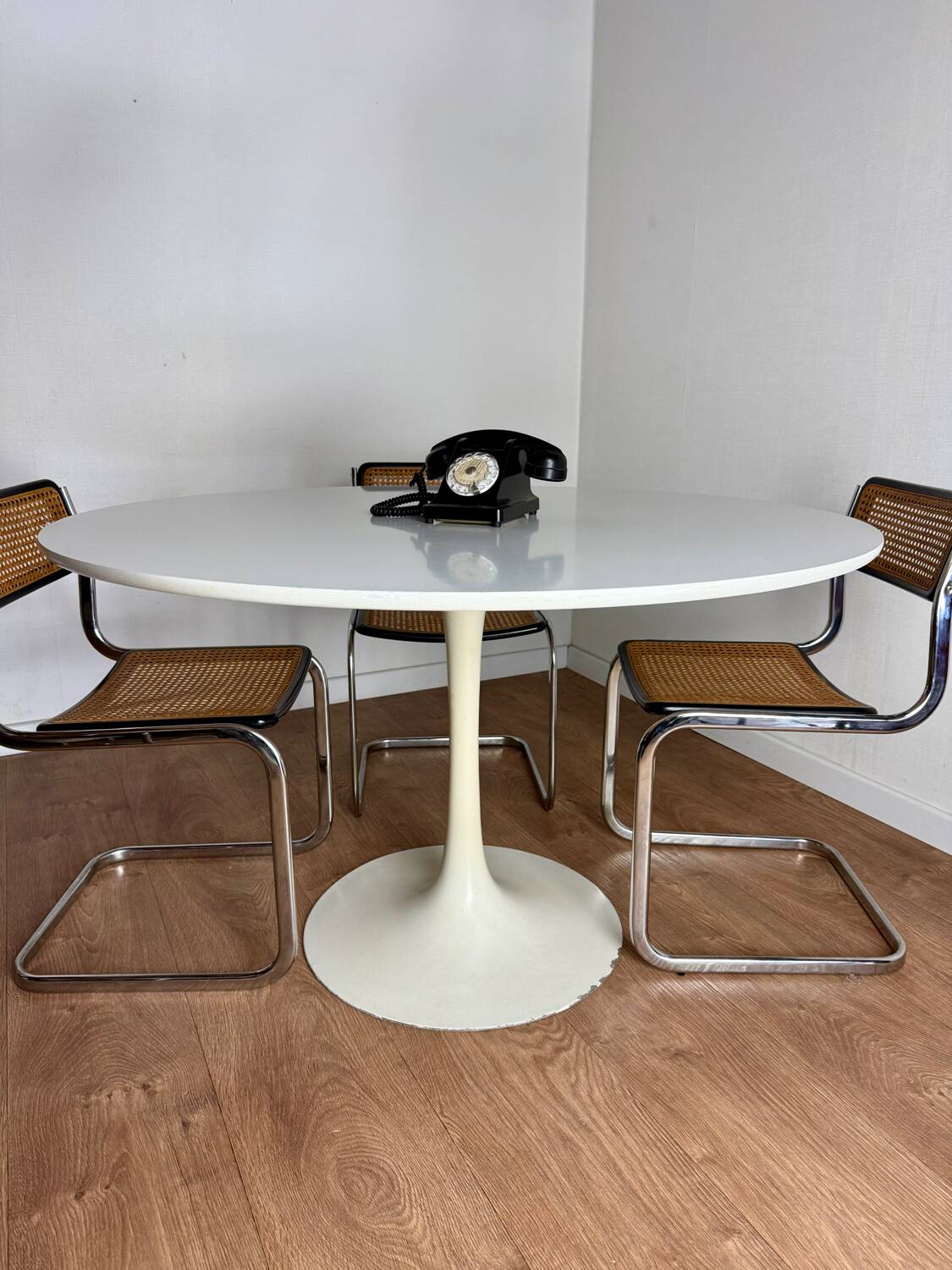 White round tulip-legged table attributed to Arkana