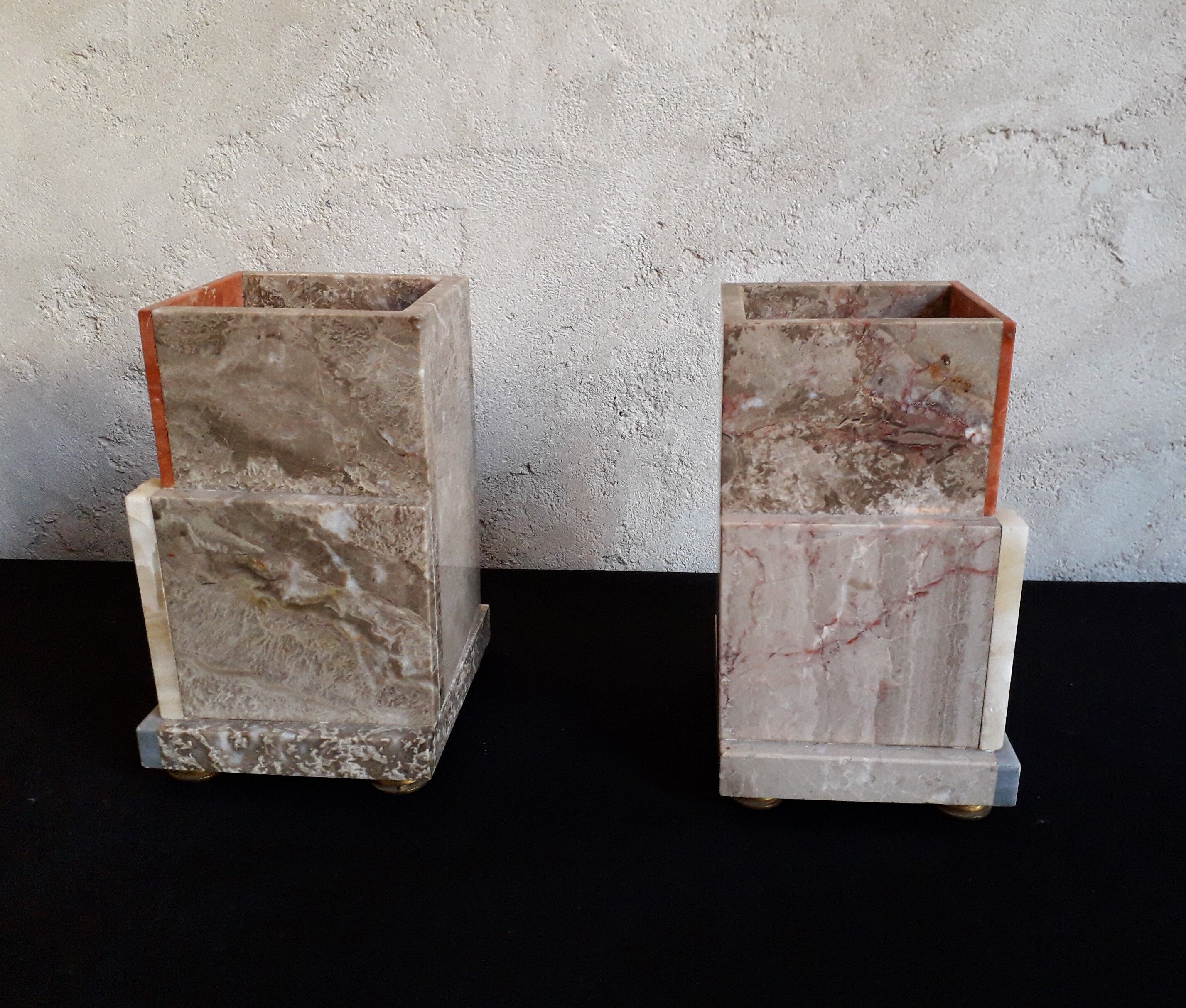 Pair of marble and onyx book clamts