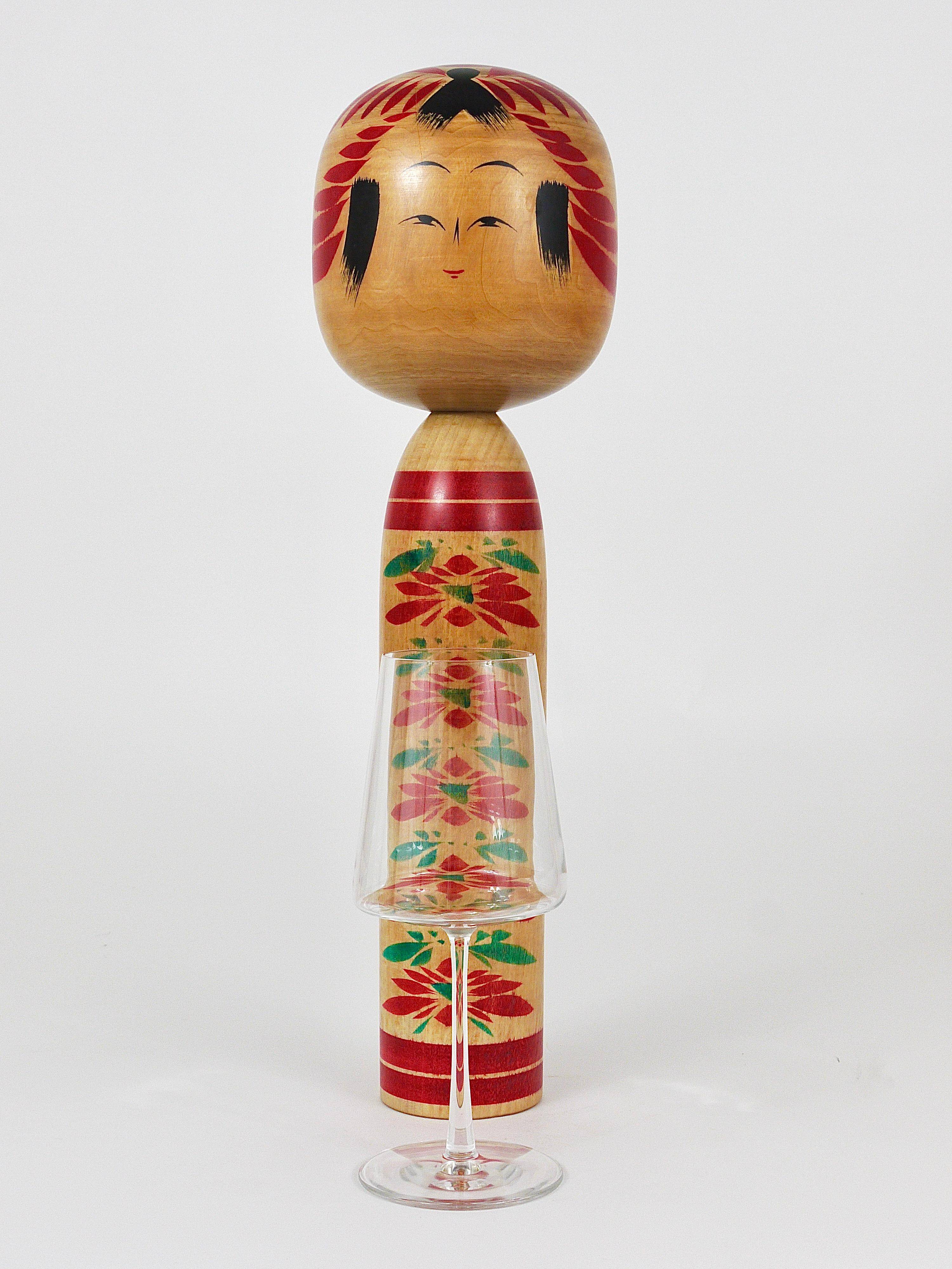 Decorative Togatta Kokeshi doll sculpture from northern Japan, hand-painted.