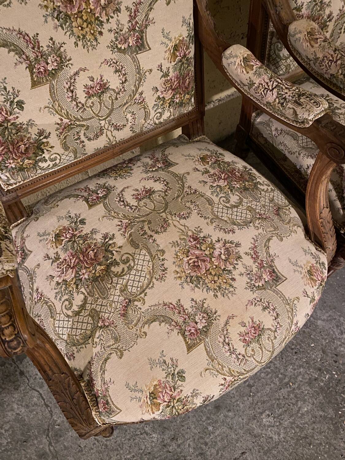 Pair of antique carved wooden armchairs