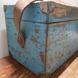 Old wooden trunk with blue patina