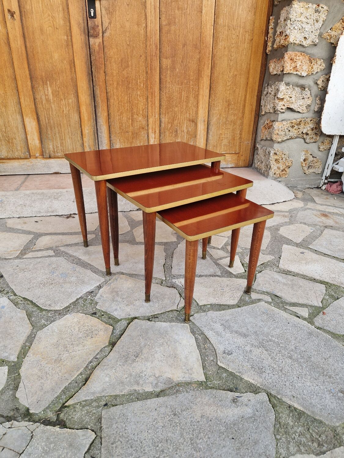 Vintage 1960s nesting coffee table.  
Large table: 54x32 H 41  
Medium