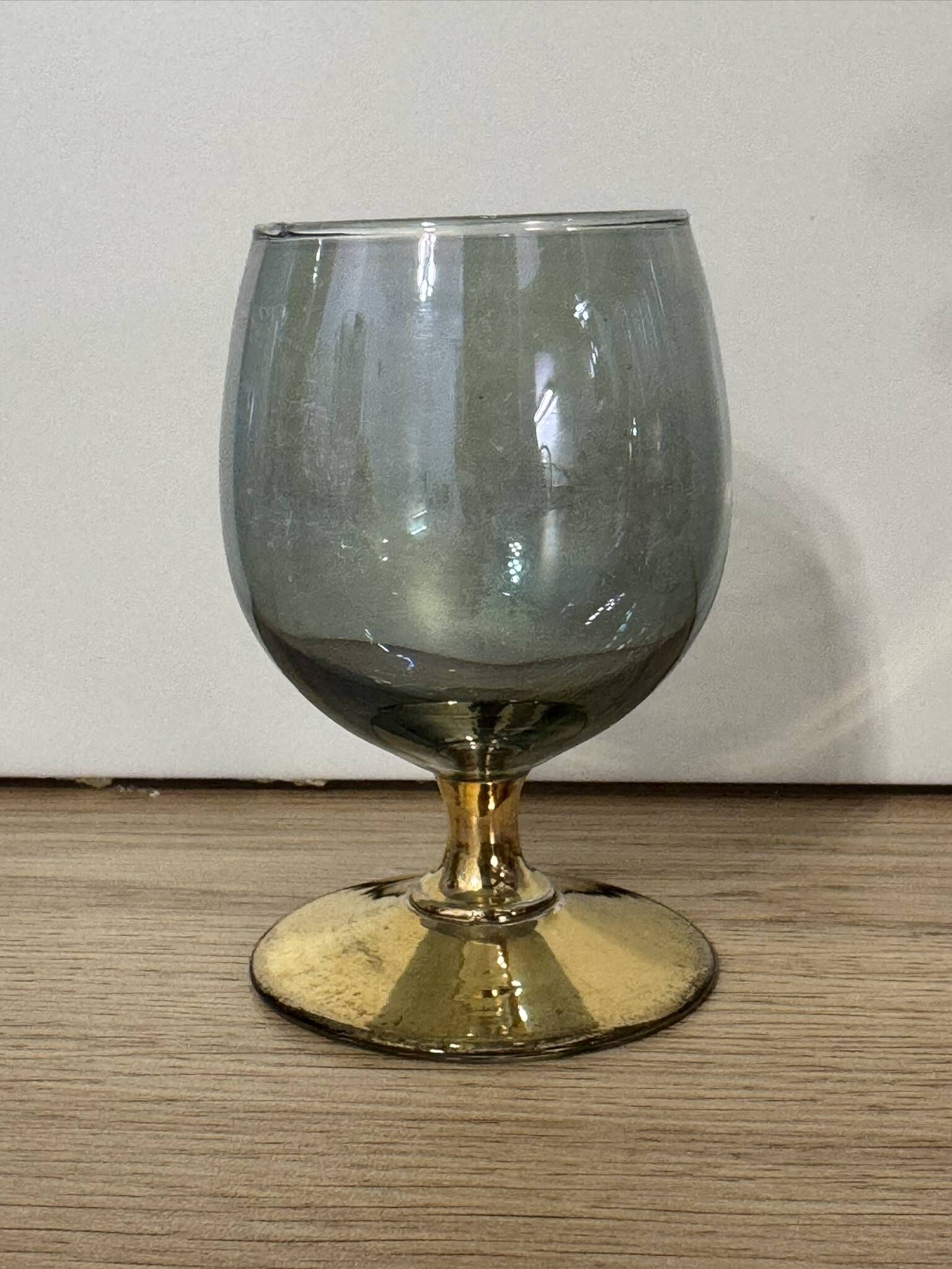 3 coloured smoked glass liqueur glasses with golden stems, vintage.