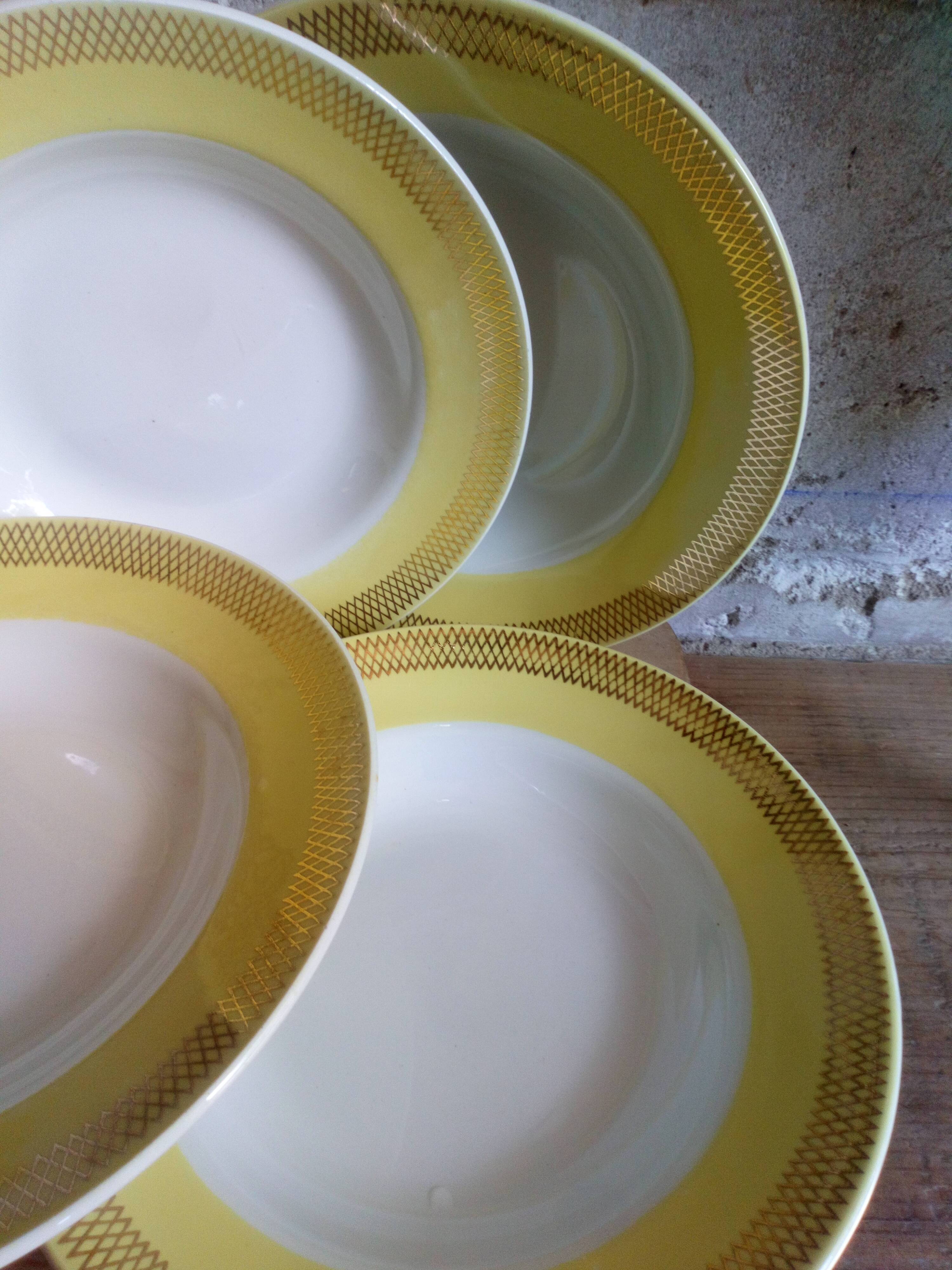 Six vintage plates with yellow and gold décor
