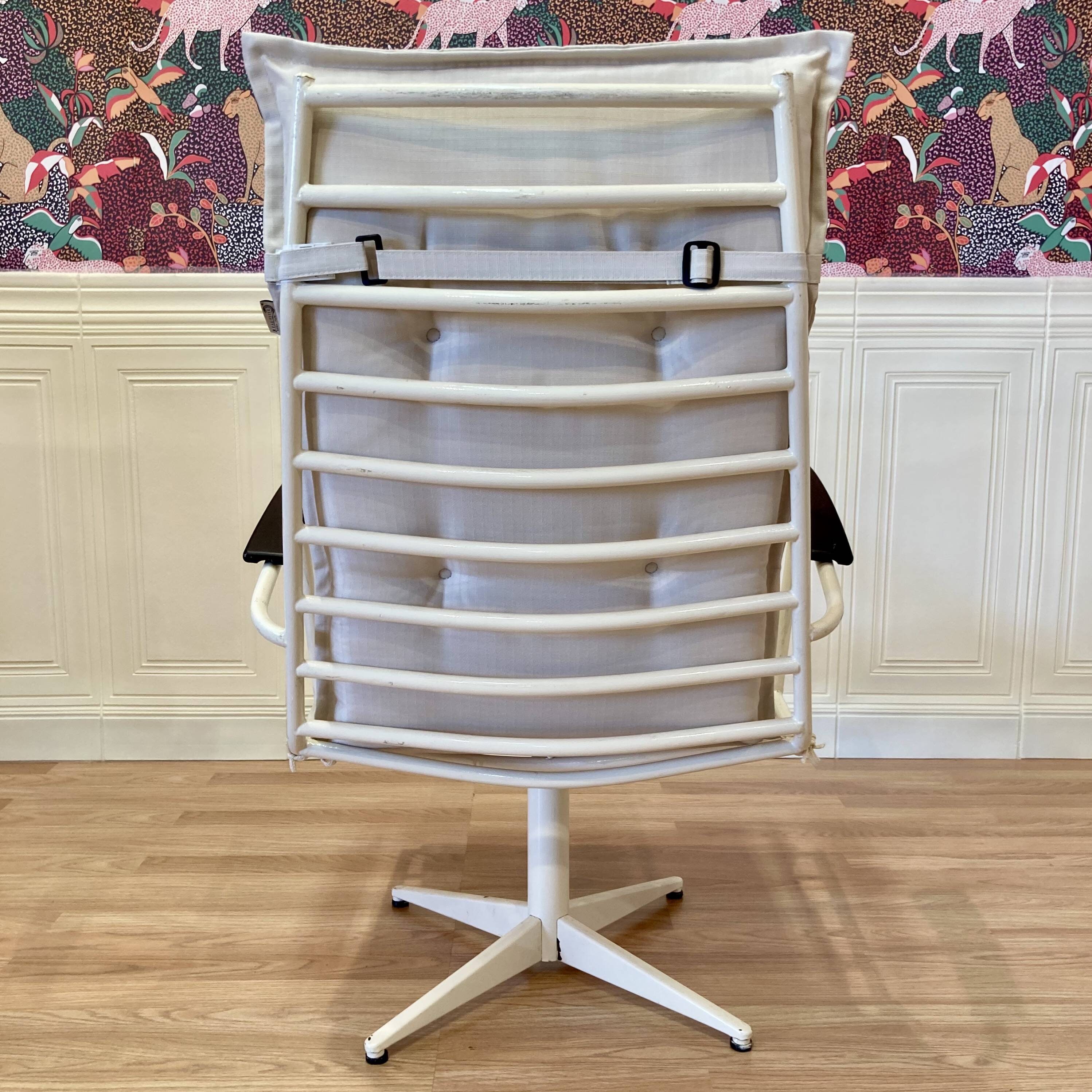 Swivel armchair in metal and Bakelite, 1960s design.