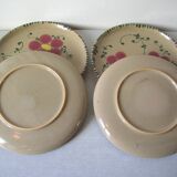 Set of 4 old large glazed ceramic flat plates with flower decor