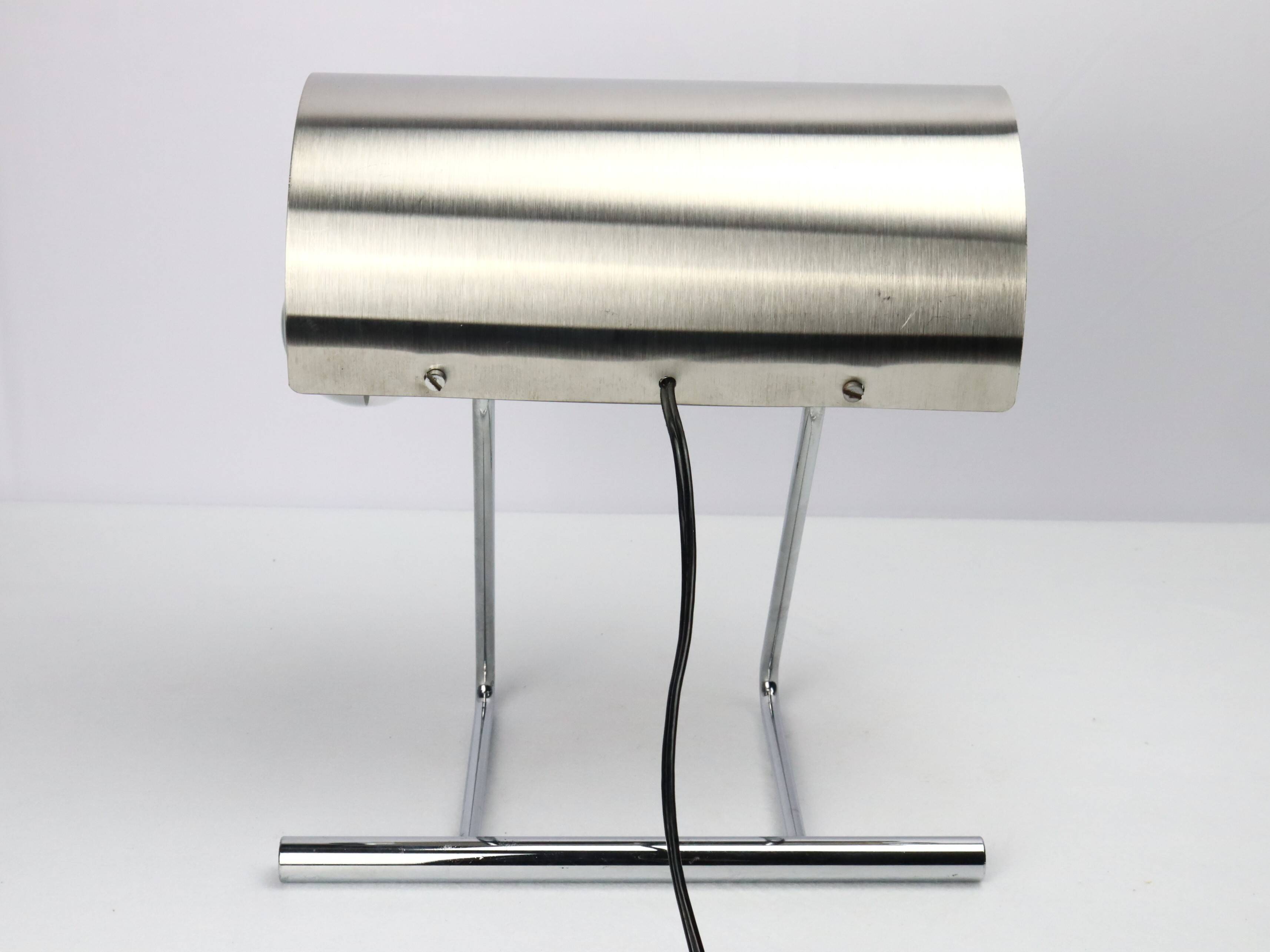 Stainless steel lamp from the 1970s in the style of François Monnet.