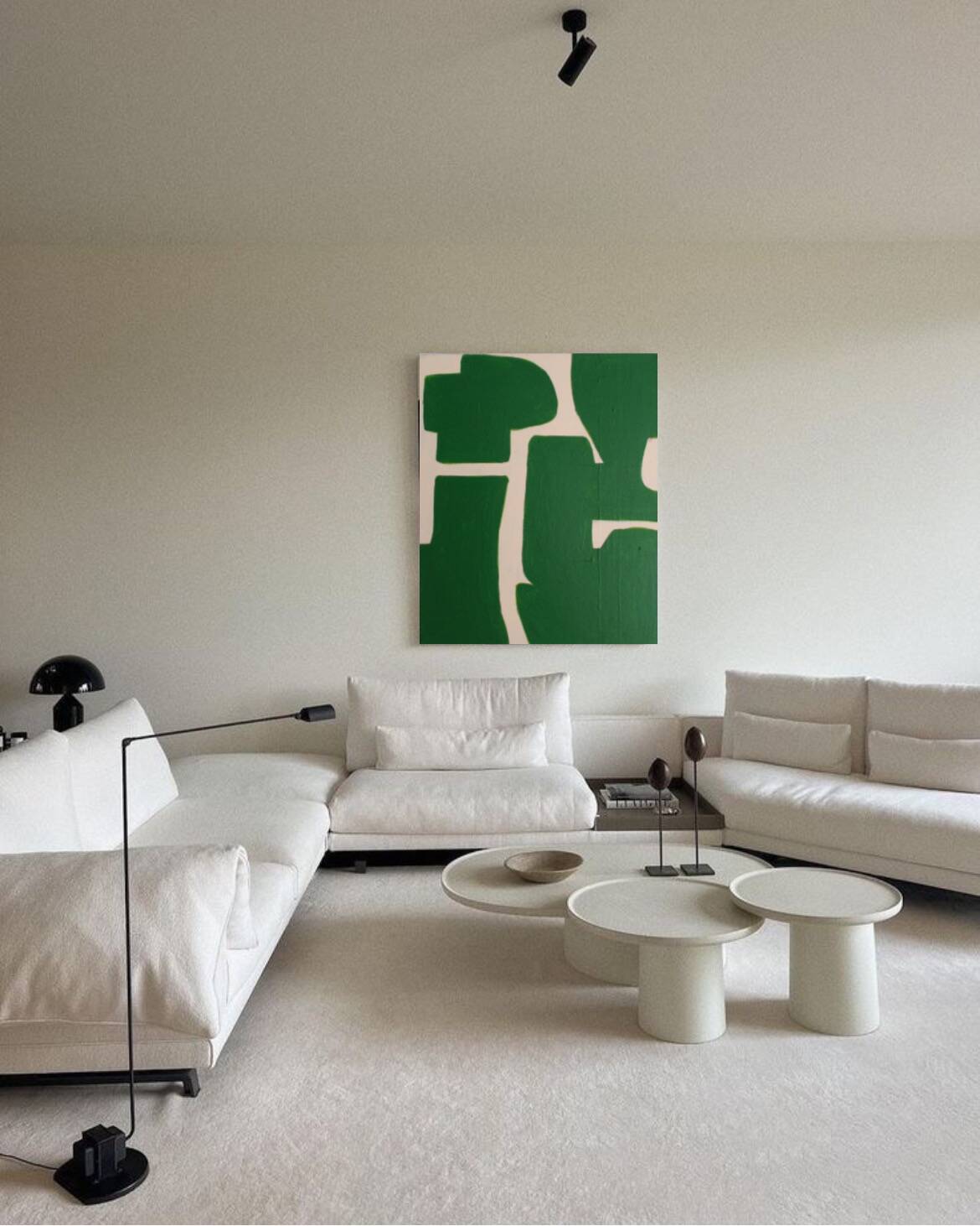 Abstract green art on a beige background.