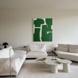 Abstract green art on a beige background.