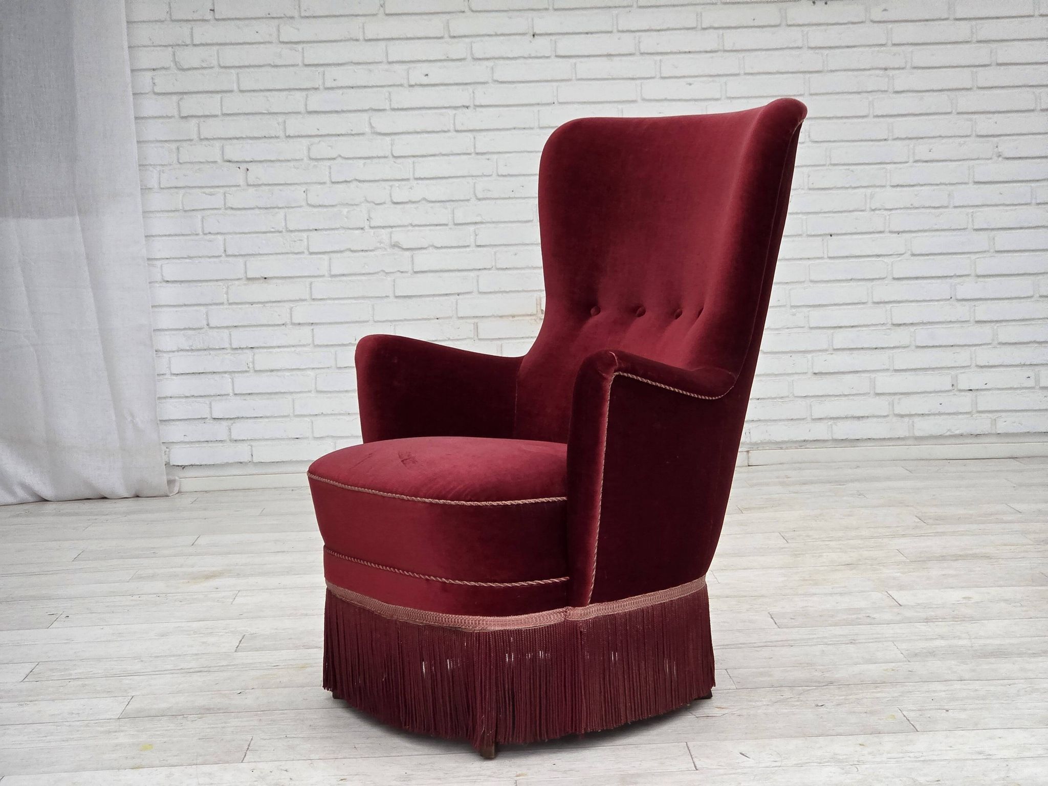 1970s, Danish armchair, cherry-red furniture velour, ash wood legs.