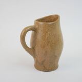 Small brown stoneware pitcher