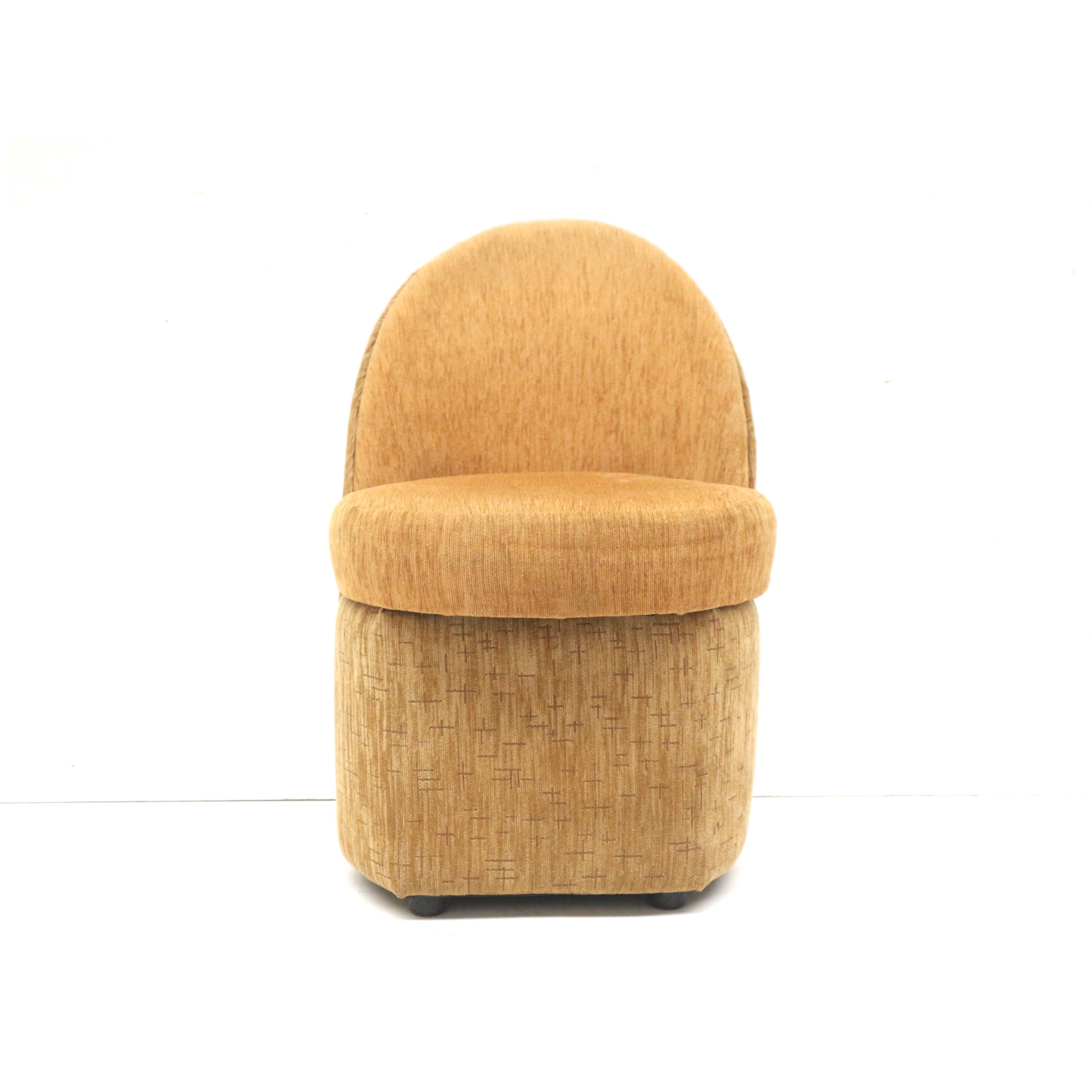 Yellow vintage armchair with storage space made in the 70s