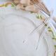 Oval plate, hand-painted meat platter in orange and green.