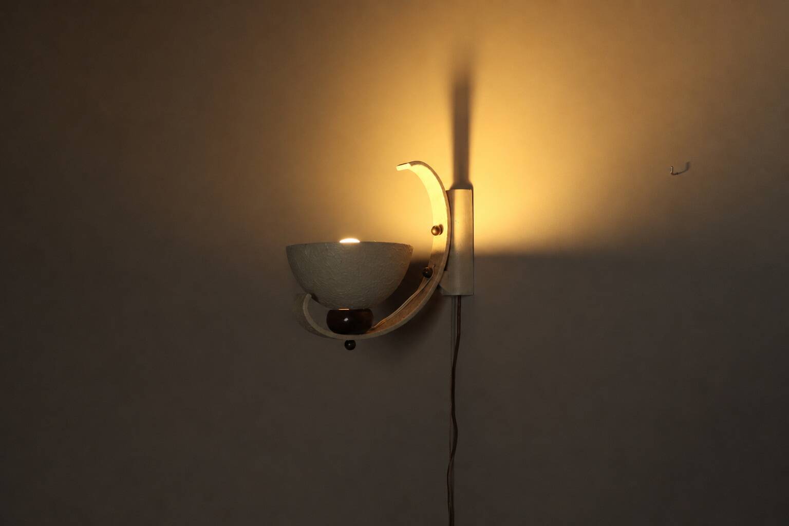 Pair of sculptural mid-century wall uplighters, circa 1950