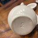 Antique white earthenware teapot, individual service with filter.