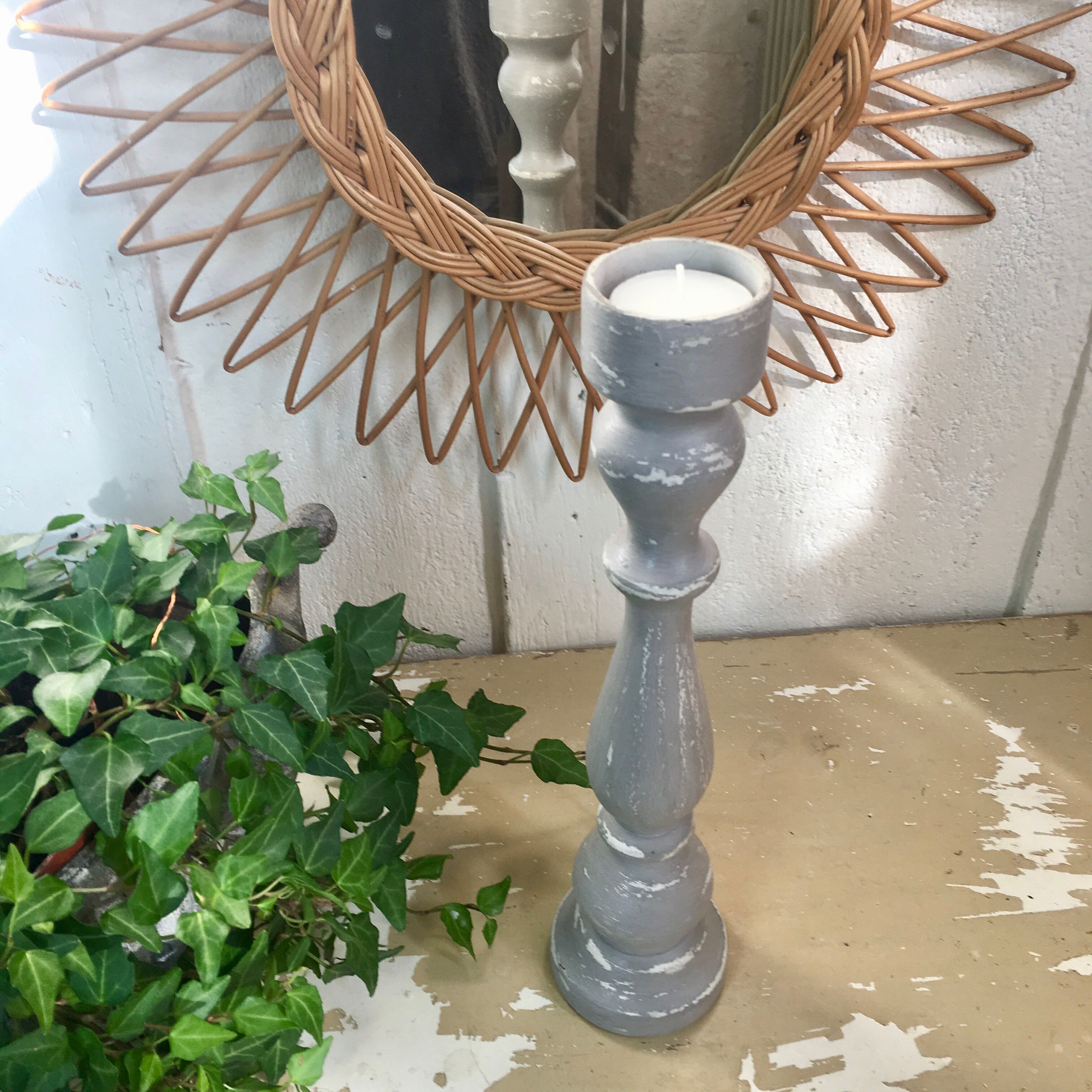 Old gray wood candlestick