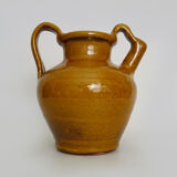 Pottery in glazed yellow terracotta. year 70 80