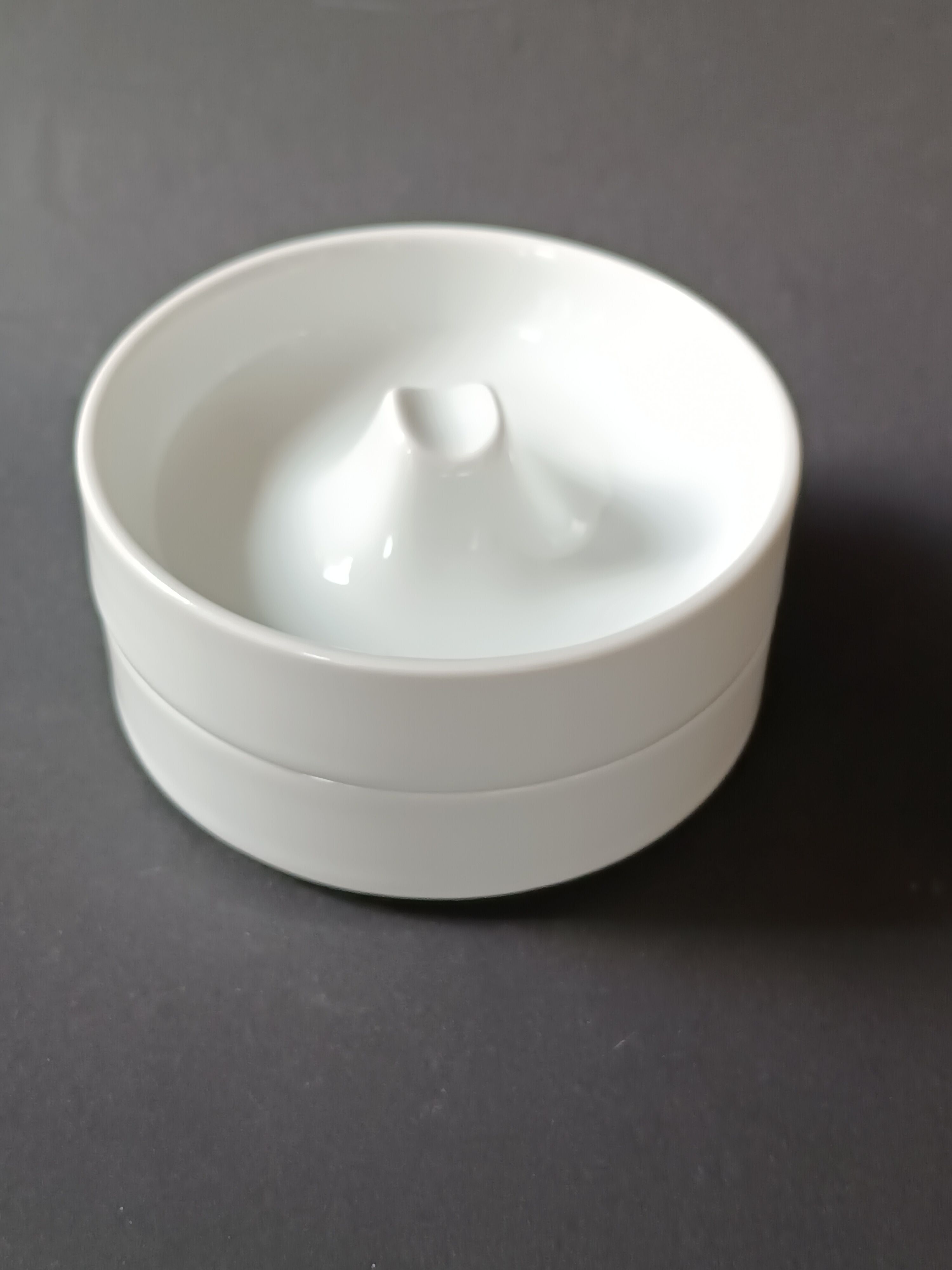 Two white porcelain ashtrays by Arzberg by Jean Luce 1960.