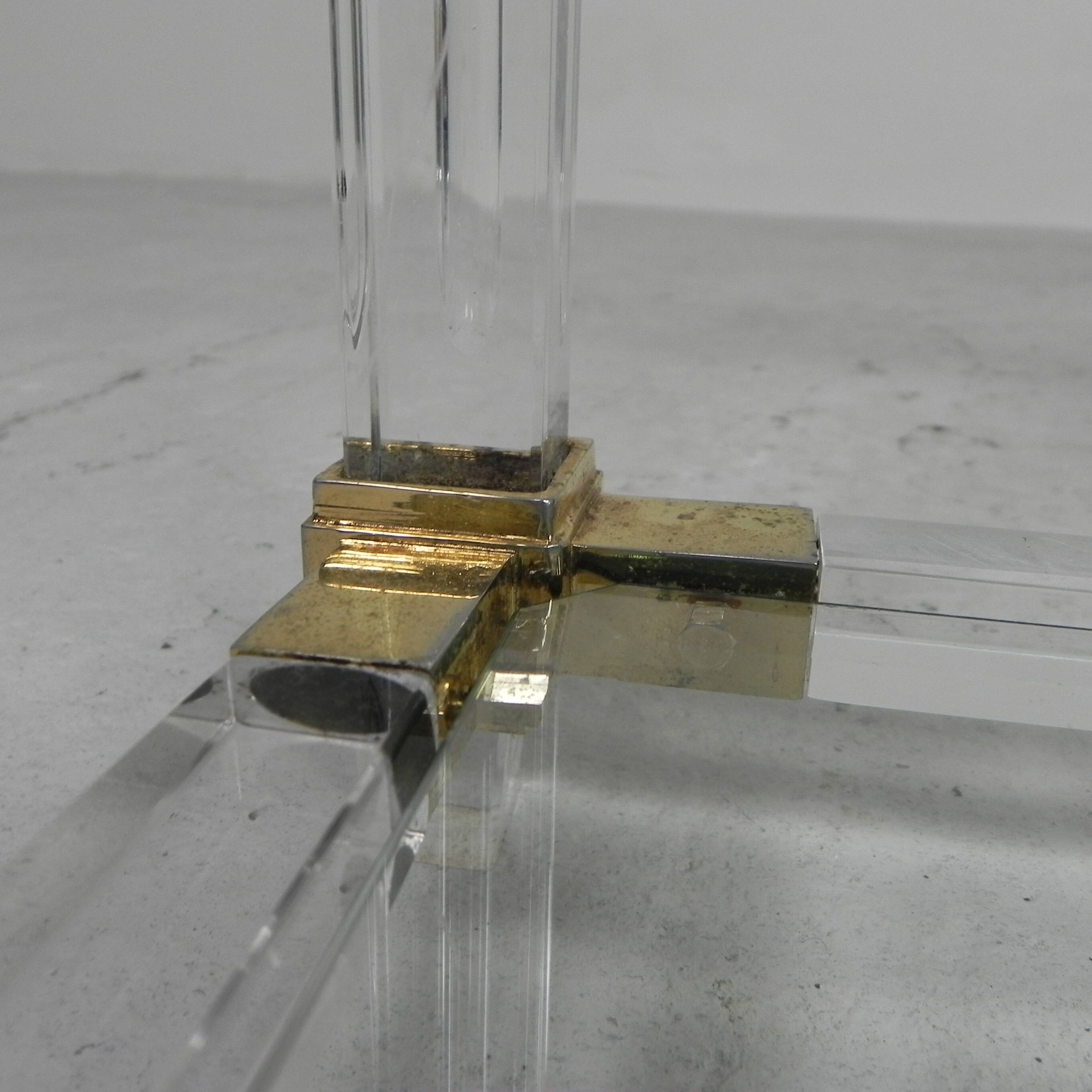 Hollywood Regency coffee table plexiglass, glass, brass, 1970s