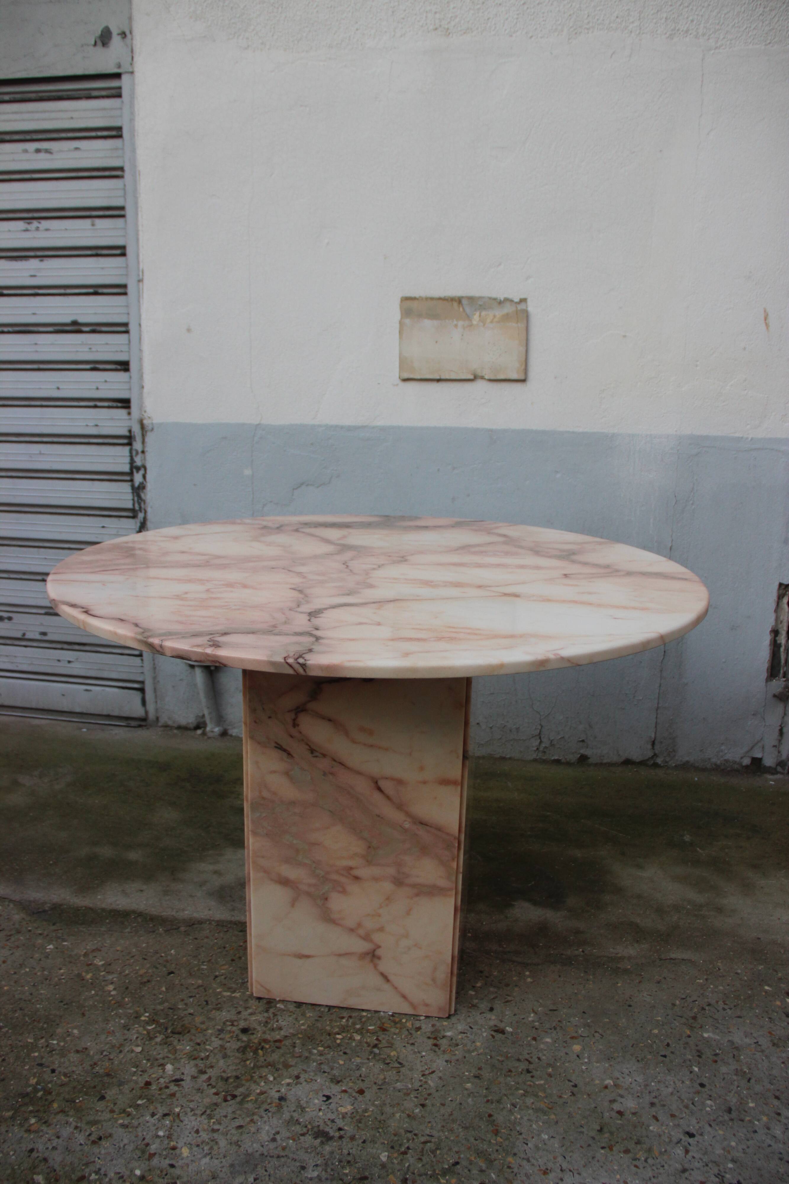 Pink marble dining table