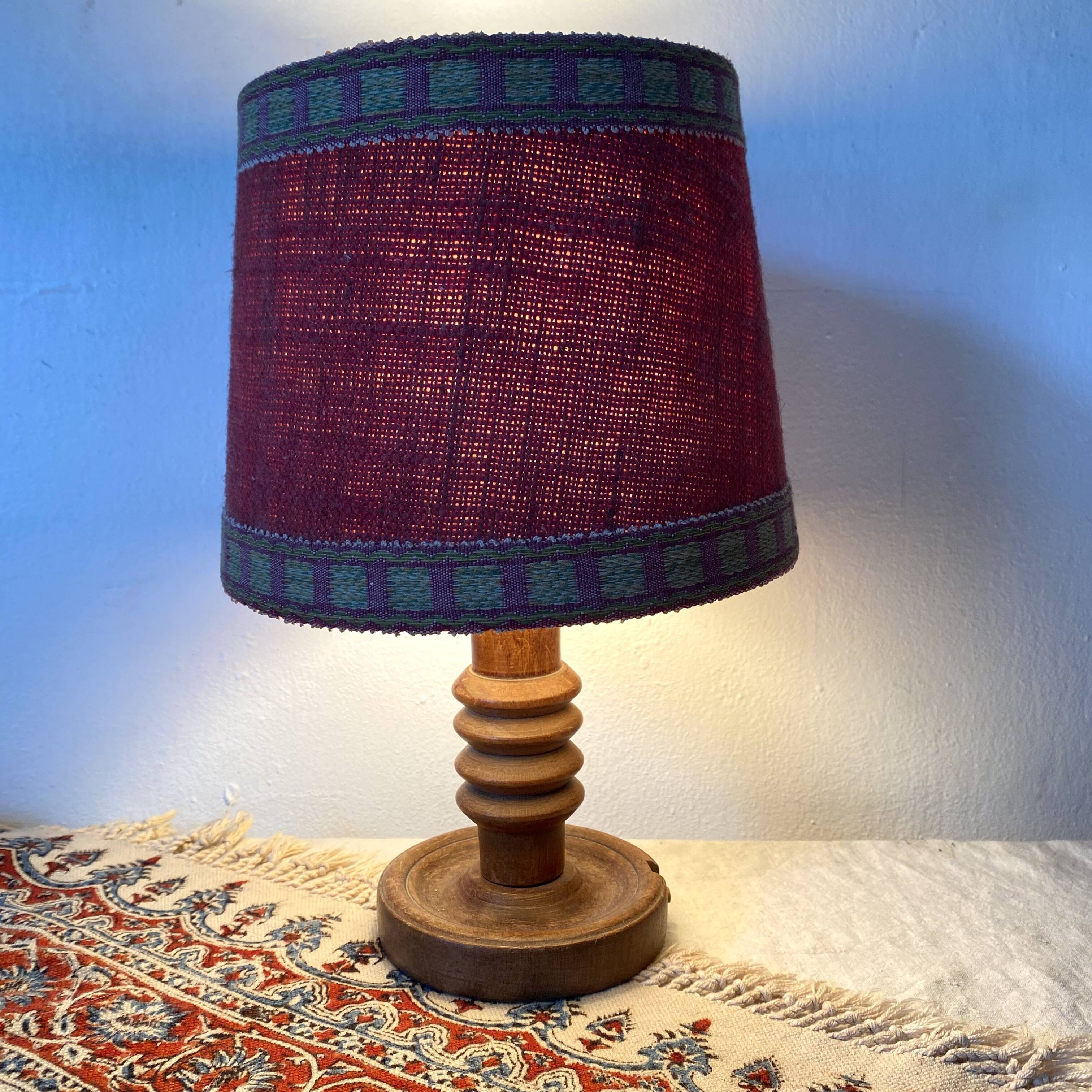 Antique lamp with turned wooden base