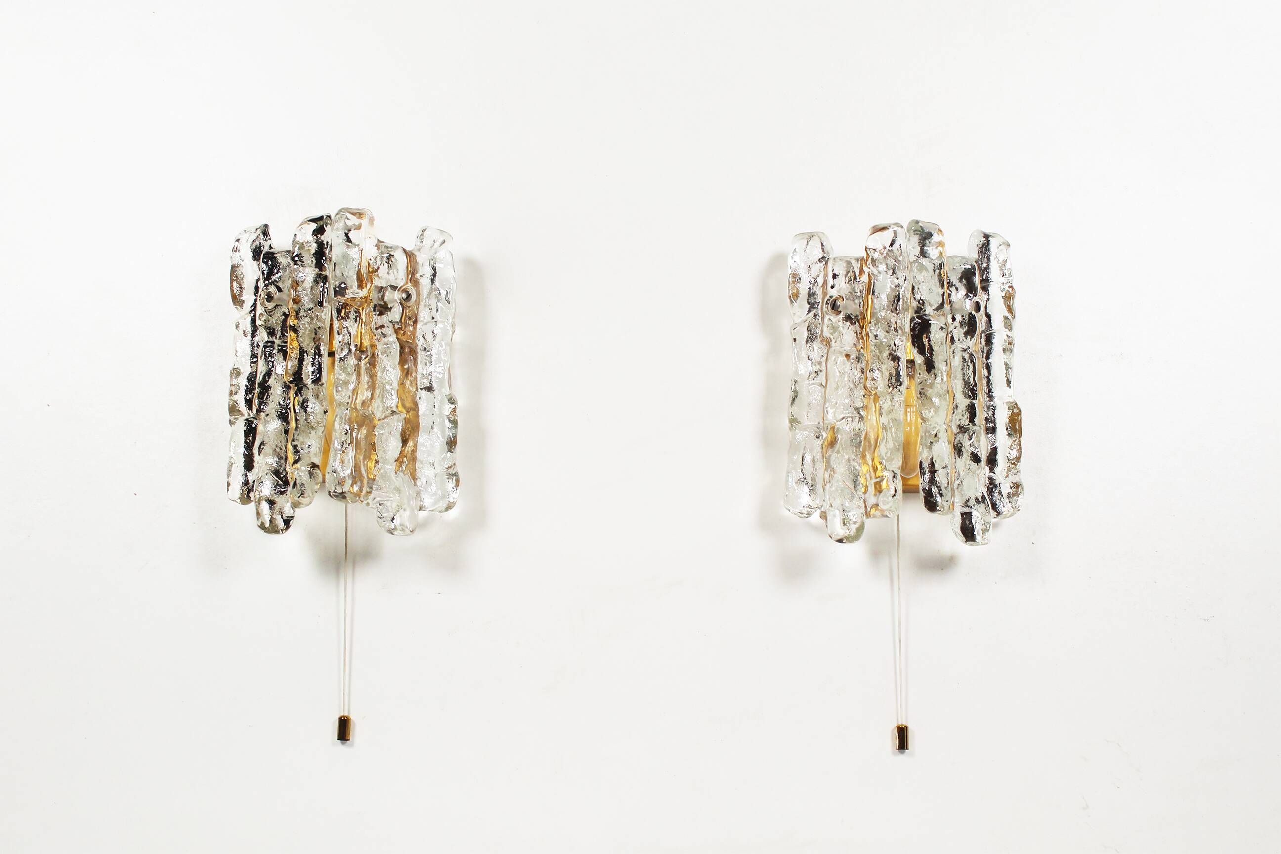 Set of two brass and heavy ice glass sconces by Kalmar, Austria 1970’s