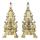 pair of Empire period dolphin firedogs in gilded bronze