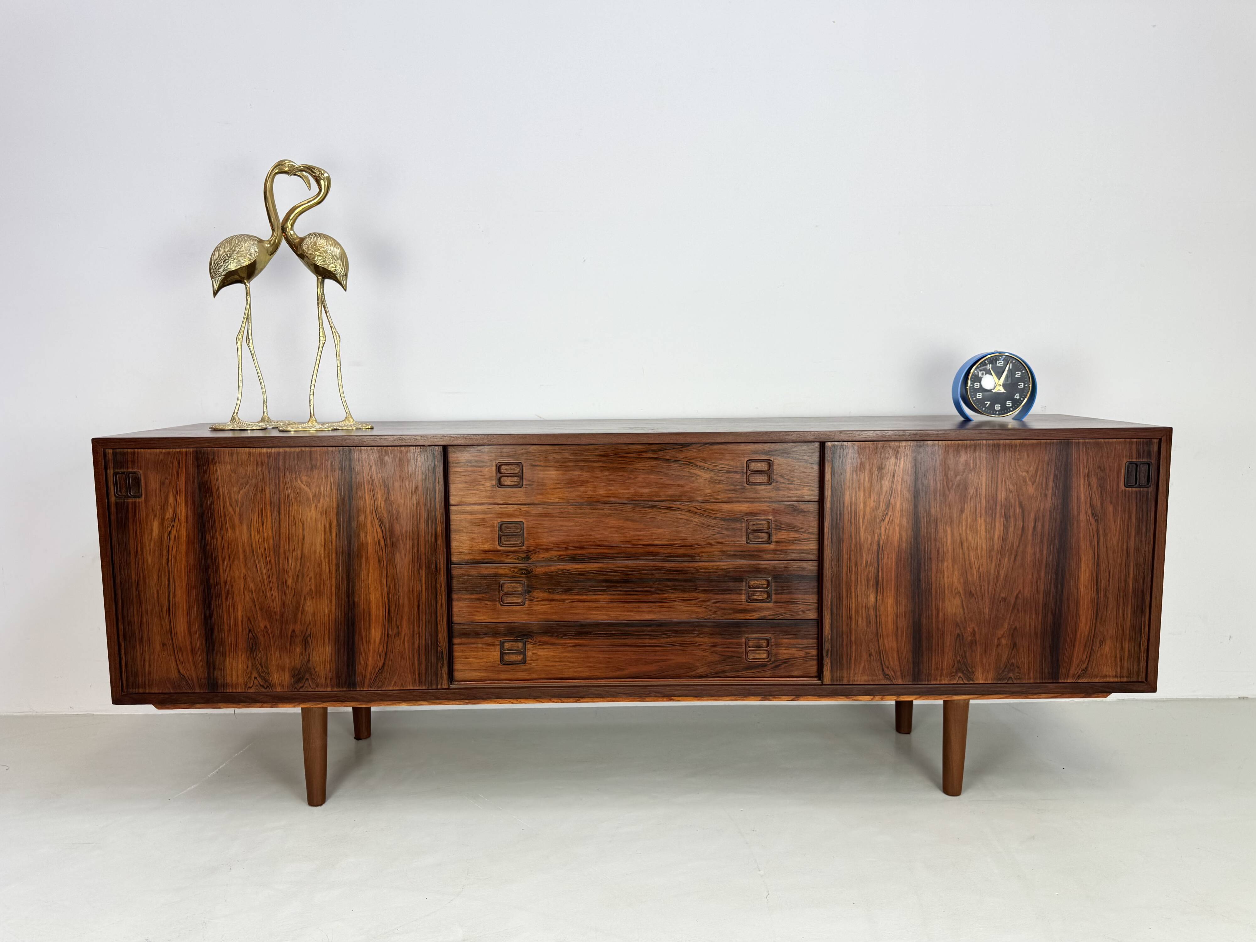 Danish rosewood vintage sideboard with sliding teak doors from the 1960s