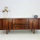 Danish rosewood vintage sideboard with sliding teak doors from the 1960s