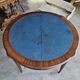 Elegant game table or circular extending side table in Louis XVI style.