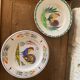 Two collection plates hand-painted rooster pattern signed fab Quimper and wolf mill hamage
