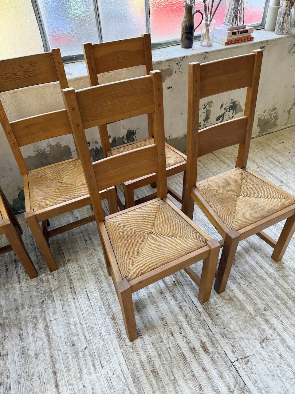 Set of 8 blond oak chairs with straw seats