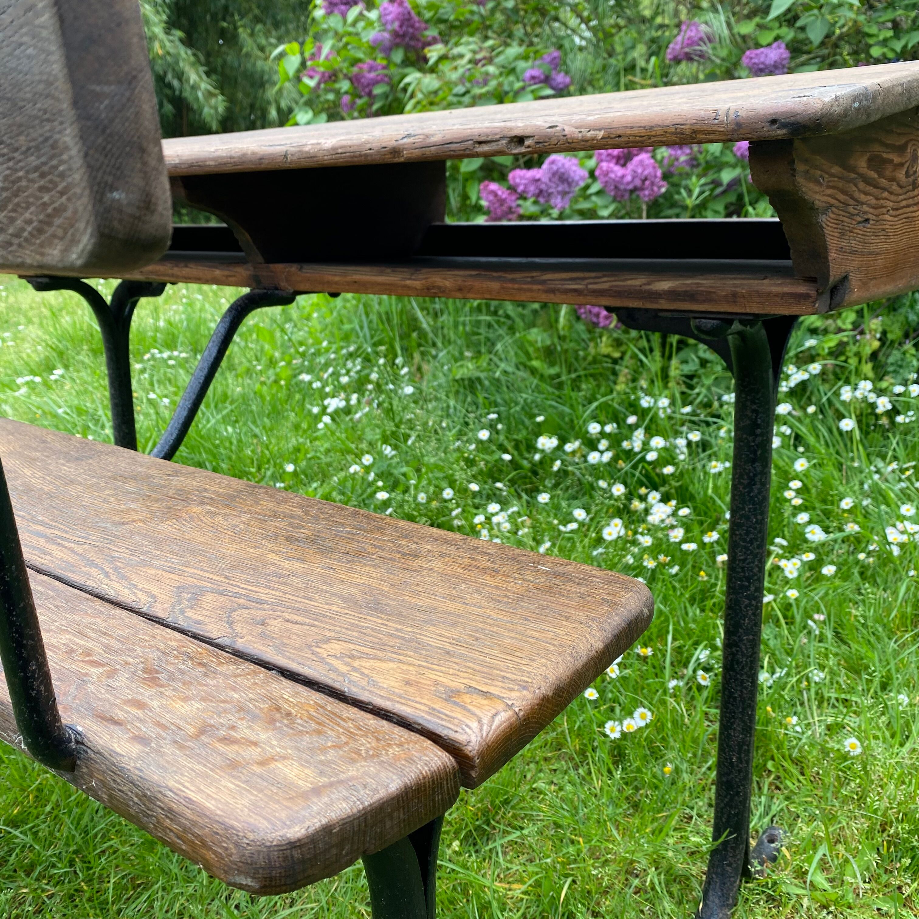 Old school desk in wood and cast iron