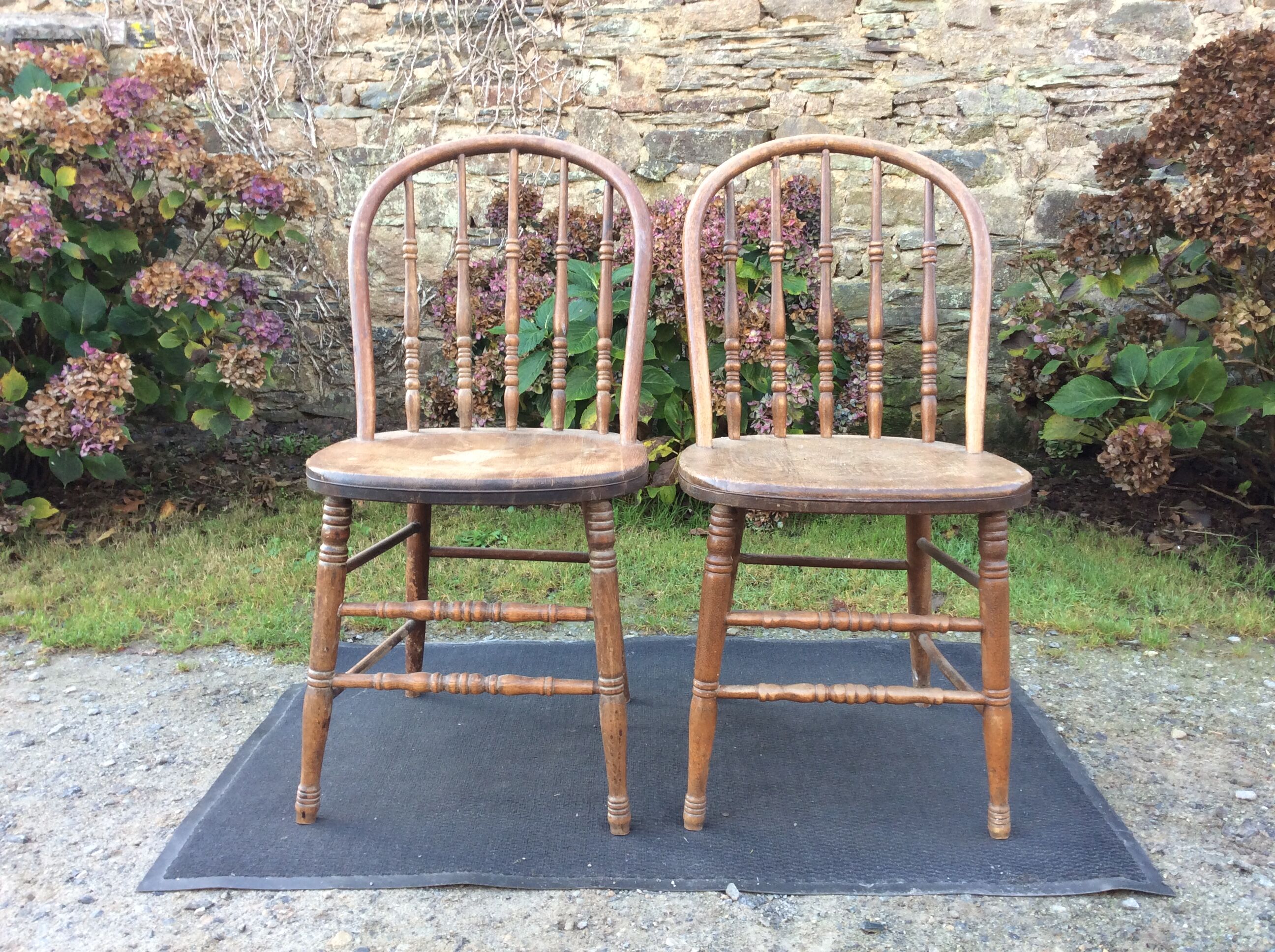 2 vintage bistro chairs called gondolas in solid oak.