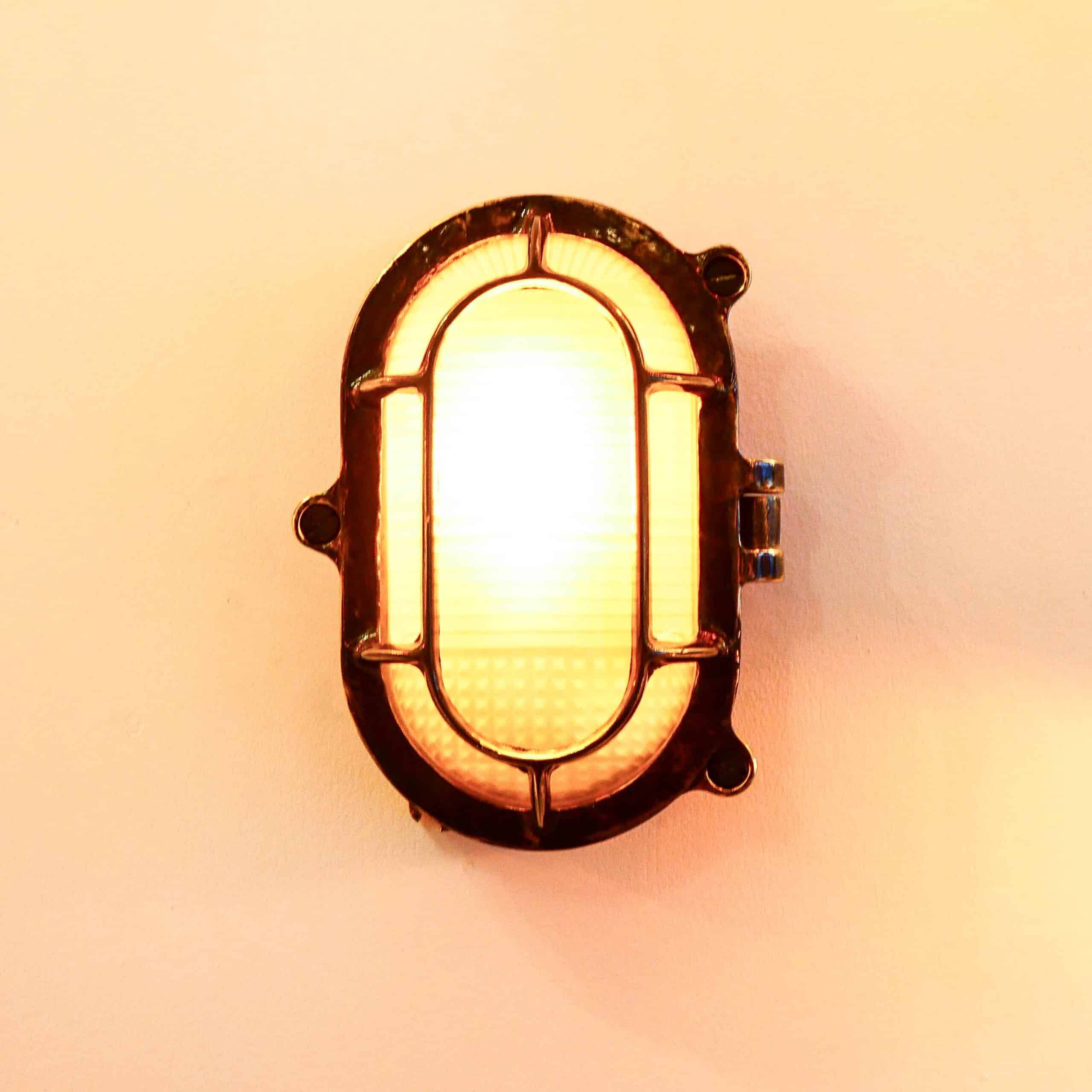 Antique Holophane wall lamp in patinated bronze