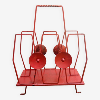 Red metal magazine rack