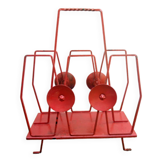 Red metal magazine rack