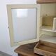 Small glass wall cabinet from the 1960s.