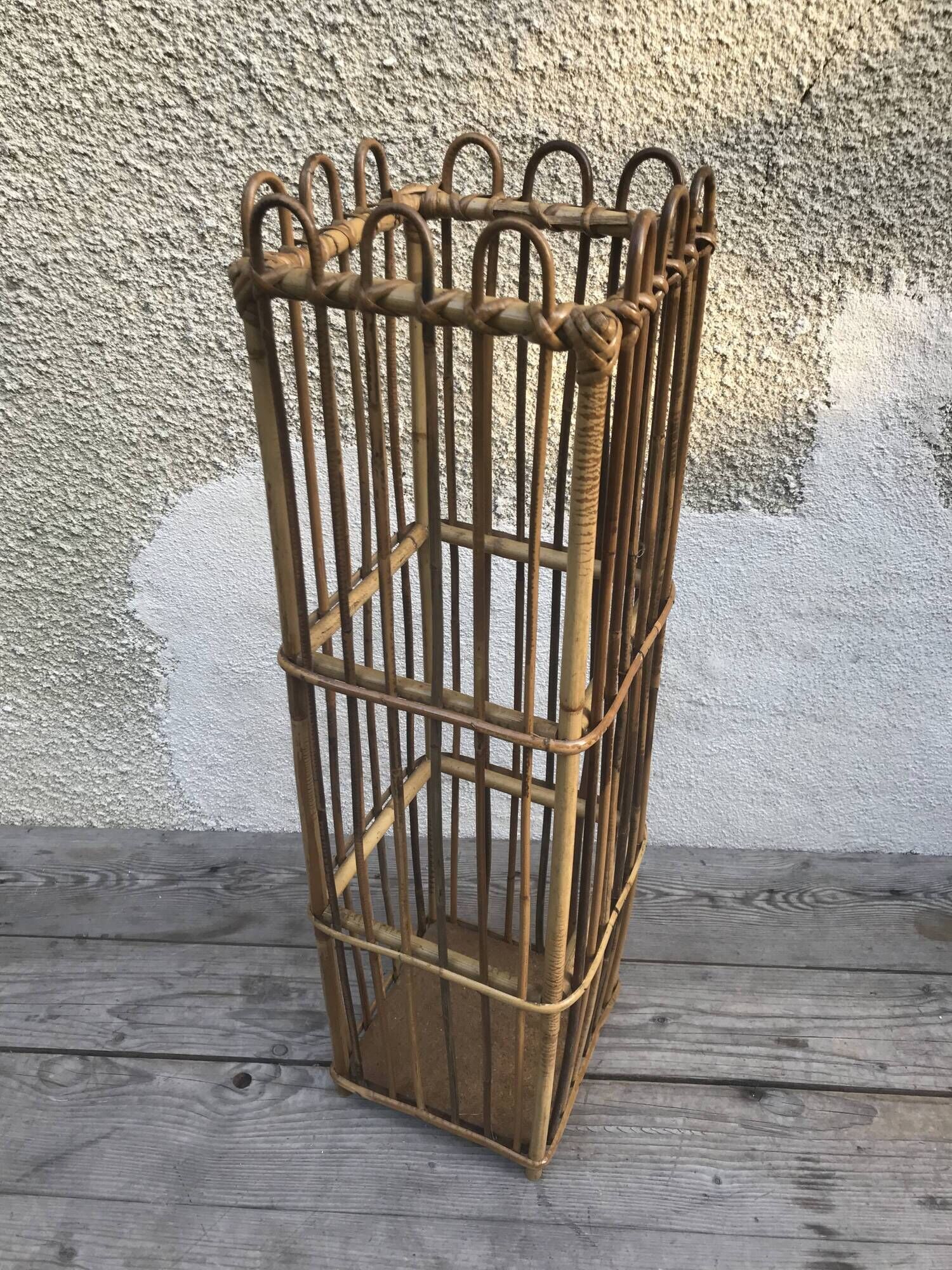 Old woven rattan umbrella holder from the 60's