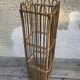 Old woven rattan umbrella holder from the 60's
