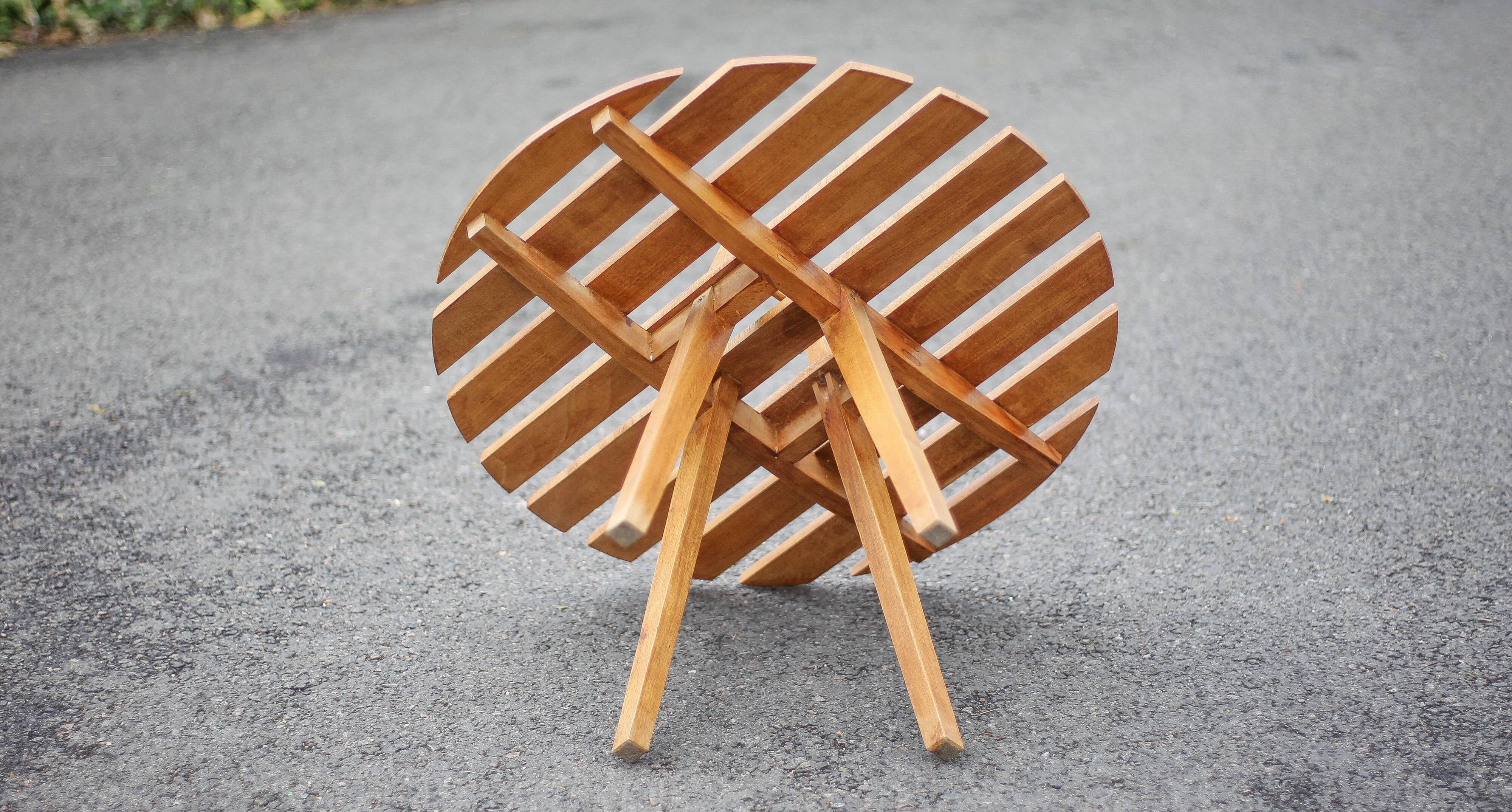 Vintage coffee table, wooden table with central handle, interior decoration, terrace, patio